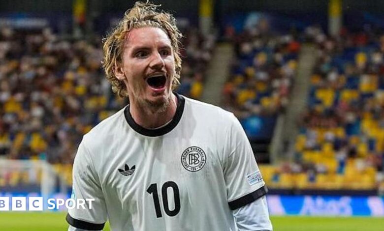 Nick Woltemade celebrates after scoring in the UEFA European Under-21 Championship 2025 quarter-final match between Germany and Italy
