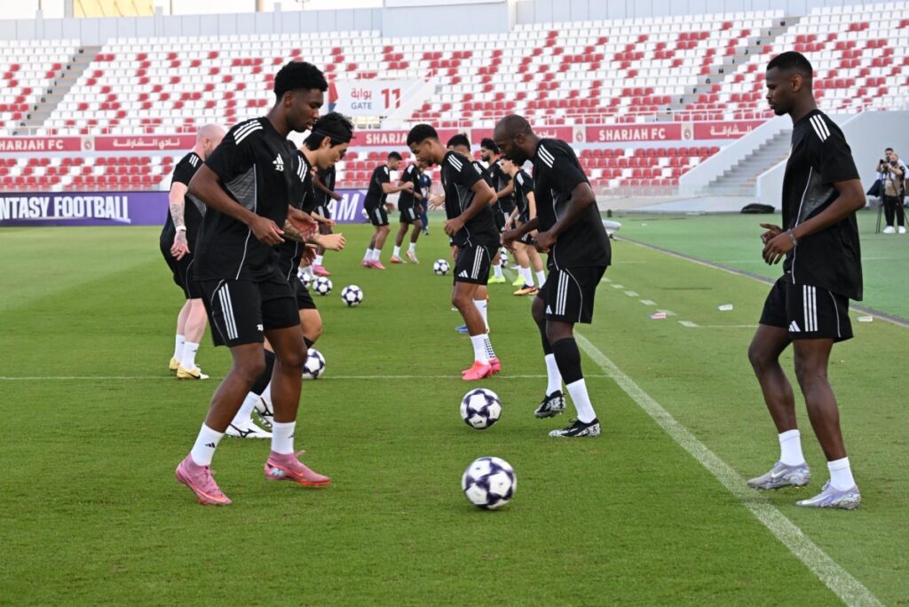 Al Gharafa players take part in a training session in Sharjah yesterday.