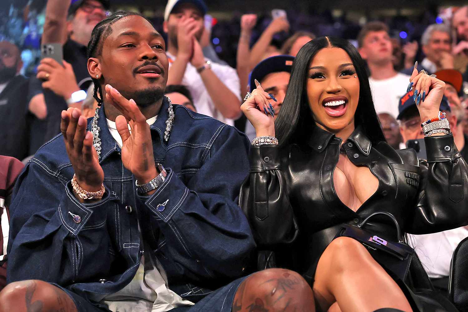 NFL Player Stefon Diggs and rapper Cardi B sits court-side during the first quarter in Game Four of the Eastern Conference Second Round NBA Playoffs