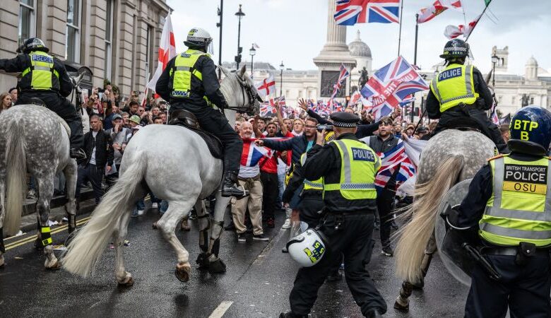 Far-right anti-immigration protests in London lead to clashes with police