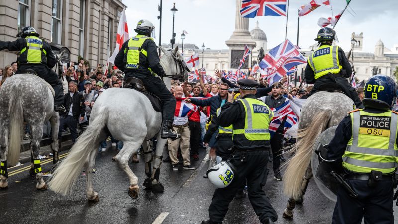 Far-right anti-immigration protests in London lead to clashes with police