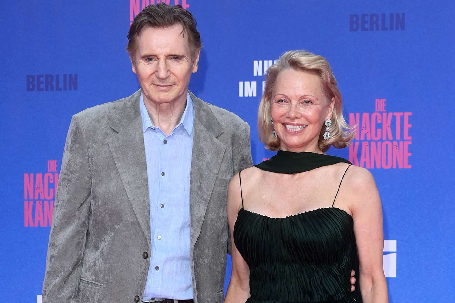 Pamela Anderson and Liam Neeson attend the Berlin premiere of the movie