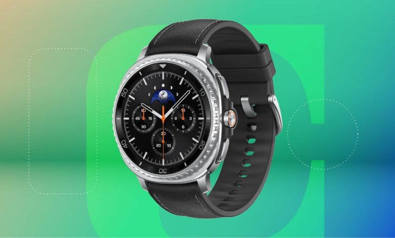 A black and silver smartwatch against a green gradient CNET background.